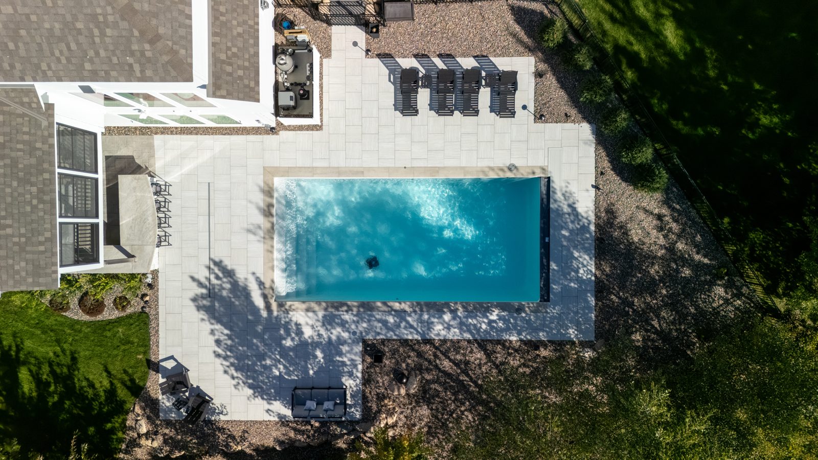 Pool, patio, retaining walls & landscape design in Woodbury, MN: Poolside on the Hill, view 4 of 9