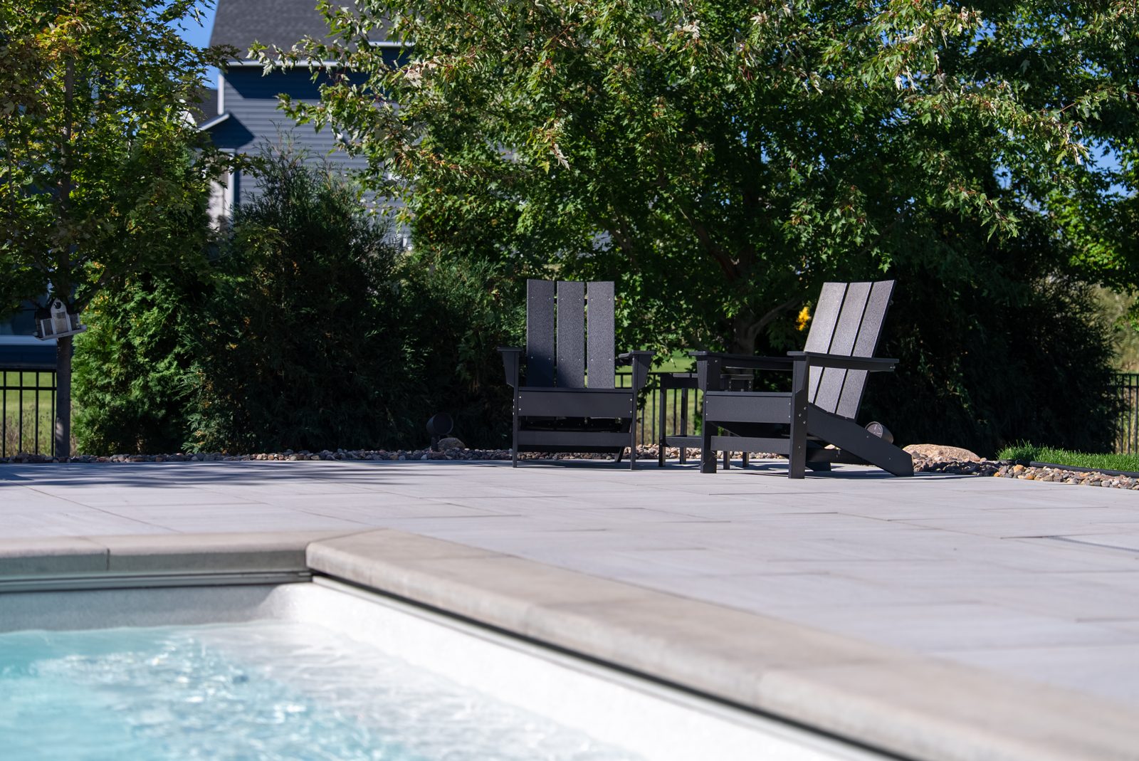 Pool, patio, retaining walls & landscape design in Woodbury, MN: Poolside on the Hill, view 5 of 9